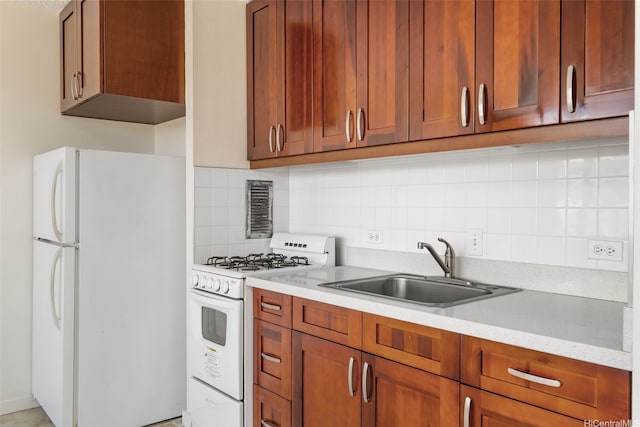 1550 Wilder Ave Unit A804, Honolulu, HI 96822 - kitchen with white appliances, a sink, light countertops, decorative backsplash, and brown cabinetry