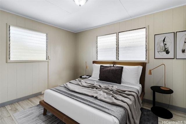 bedroom with light wood-style floors