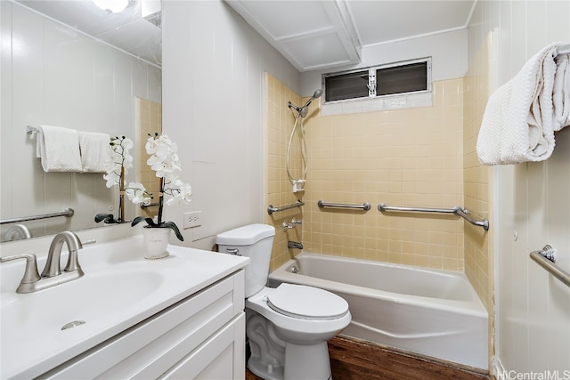 bathroom with toilet, vanity, shower / bathtub combination, and wood finished floors