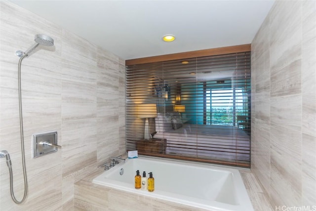 2139 Kuhio Ave Unit 1207, Honolulu, HI 96815 - bathroom featuring a tile shower, tile walls, and a bath
