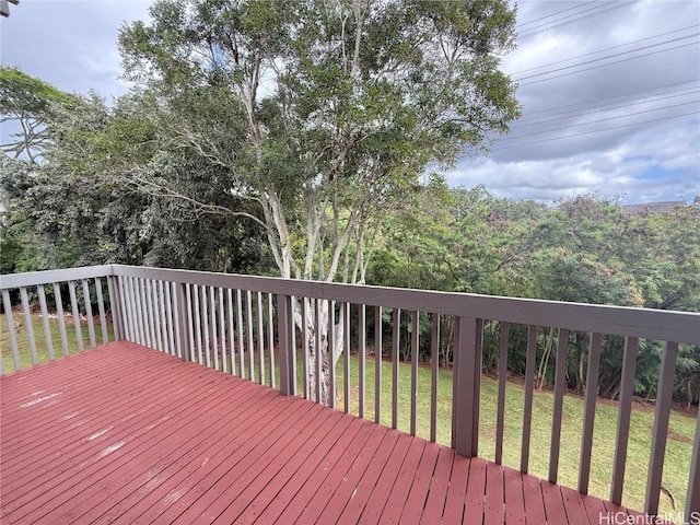 wooden terrace with a yard