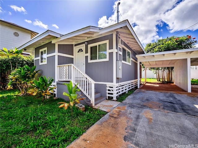 bungalow-style house with driveway