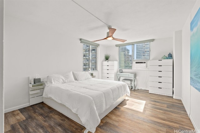 bedroom featuring dark wood-style flooring and ceiling fan