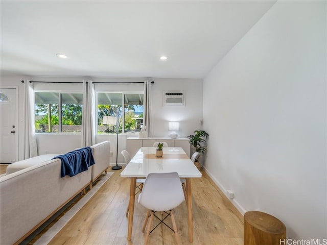 14 Hauola St, Wahiawa, HI 96786 - dining space with light wood-style floors, recessed lighting, baseboards, and a wall mounted AC