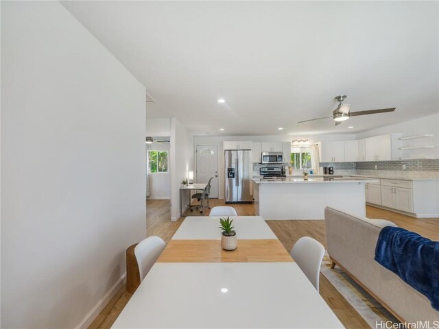 14 Hauola St, Wahiawa, HI 96786 - dining space featuring baseboards, plenty of natural light, light wood-style flooring, and recessed lighting