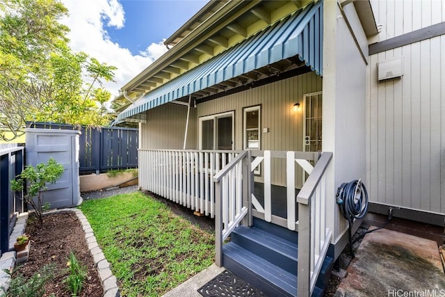 view of home's exterior featuring fence