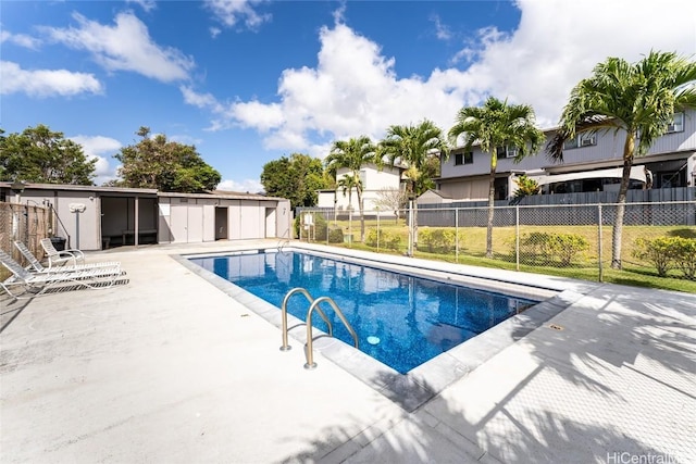 view of pool with a patio, fence, and a fenced in pool