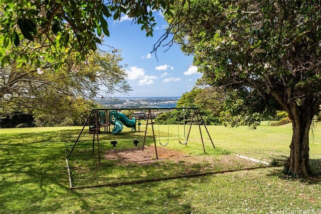 view of playground with a yard