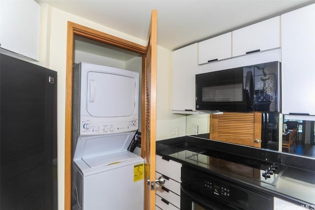 laundry area with stacked washer and clothes dryer