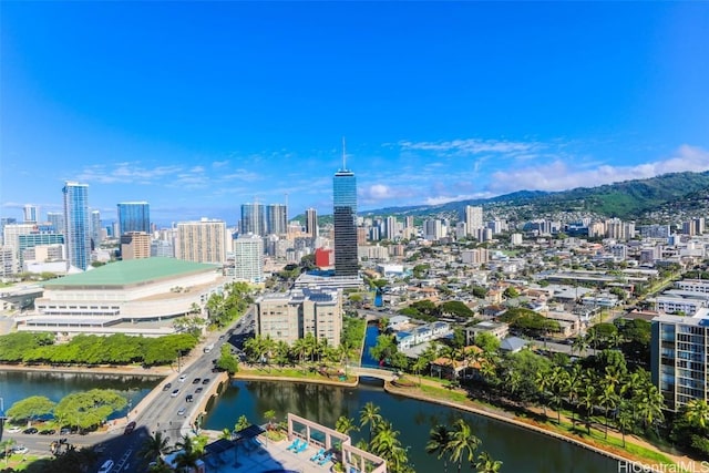 property's view of city with a water view