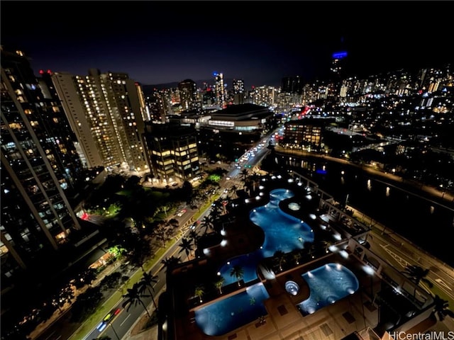 aerial view at night with a view of city lights