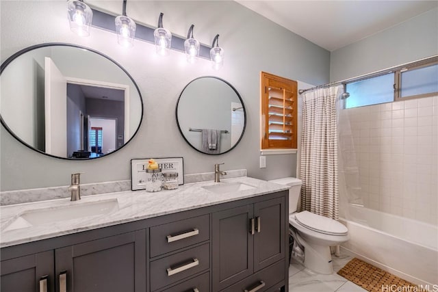 bathroom featuring shower / tub combo with curtain, marble finish floor, a sink, and double vanity