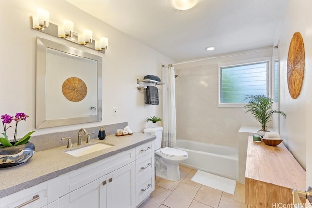 full bath featuring shower / bathtub combination with curtain, vanity, toilet, and tile patterned floors