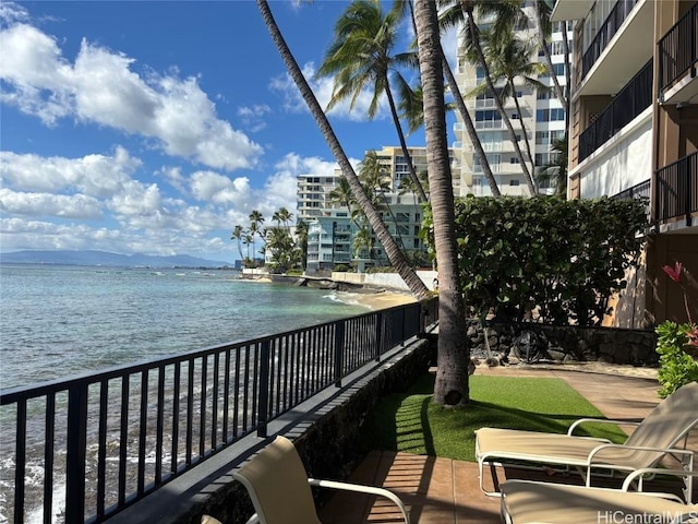 balcony featuring a water view