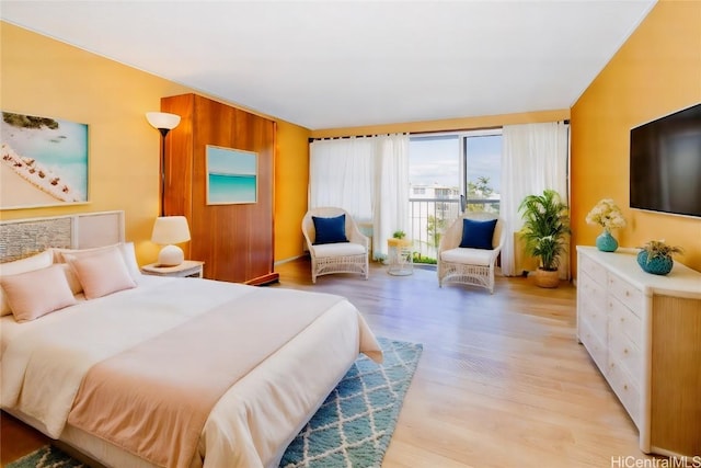 bedroom with light wood finished floors