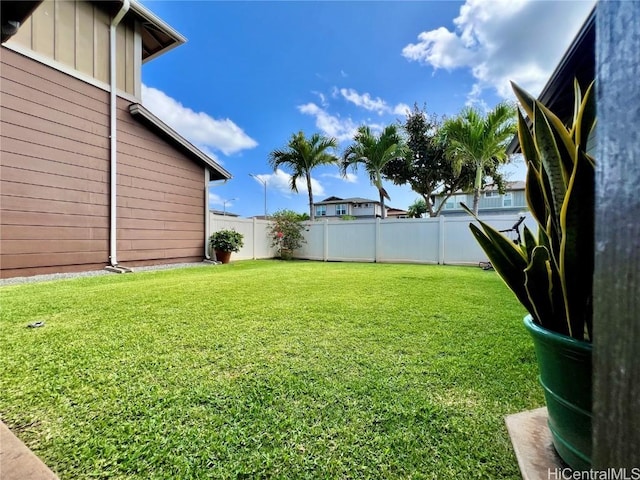 view of yard with a fenced backyard