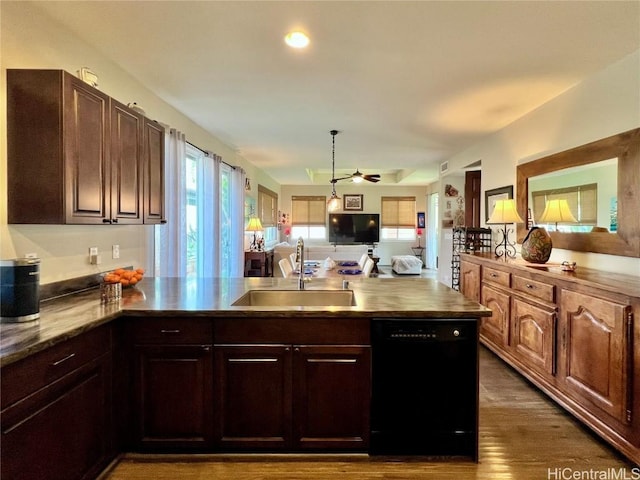 kitchen with dark wood-style flooring, dark brown cabinetry, a sink, dishwasher, and a peninsula