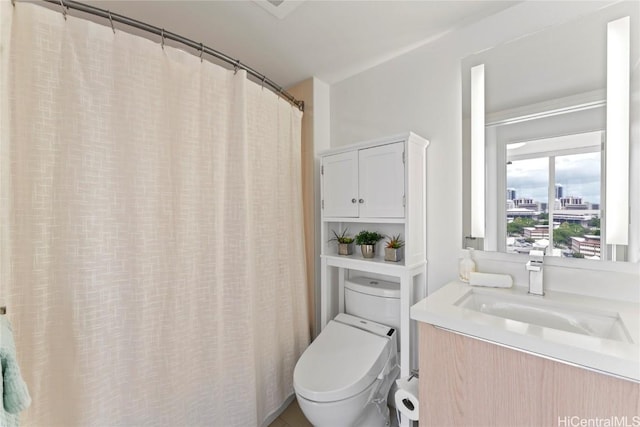 full bath with vanity and toilet