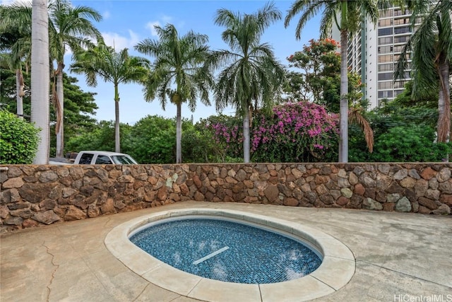 view of swimming pool featuring a patio area