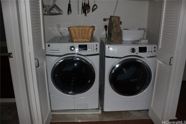 washroom with washer and dryer and laundry area