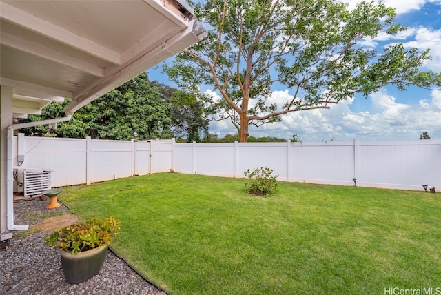 view of yard with a fenced backyard