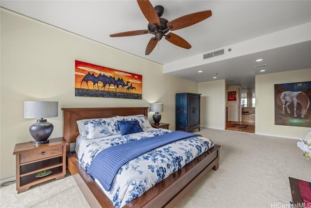 carpeted bedroom featuring recessed lighting, visible vents, ensuite bathroom, a ceiling fan, and baseboards