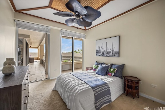 carpeted bedroom with ensuite bathroom, access to exterior, and baseboards