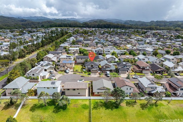 drone / aerial view featuring a residential view and a mountain view