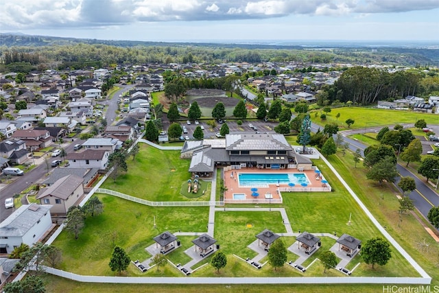 birds eye view of property with a residential view