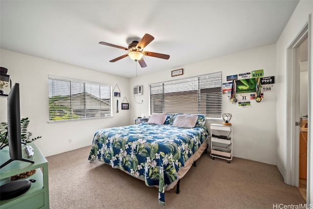 bedroom featuring ceiling fan, an AC wall unit, and carpet floors