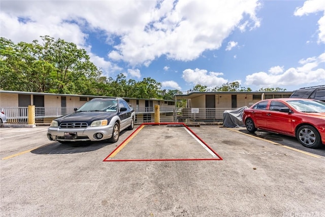 view of uncovered parking lot