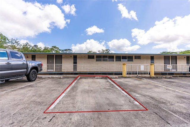 view of uncovered parking lot