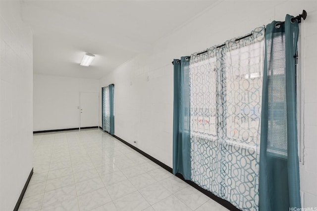 spare room featuring tile patterned floors