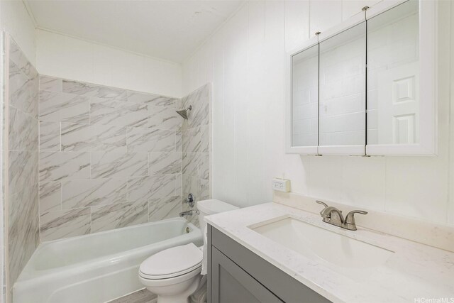 full bath with shower / bathtub combination, vanity, and toilet