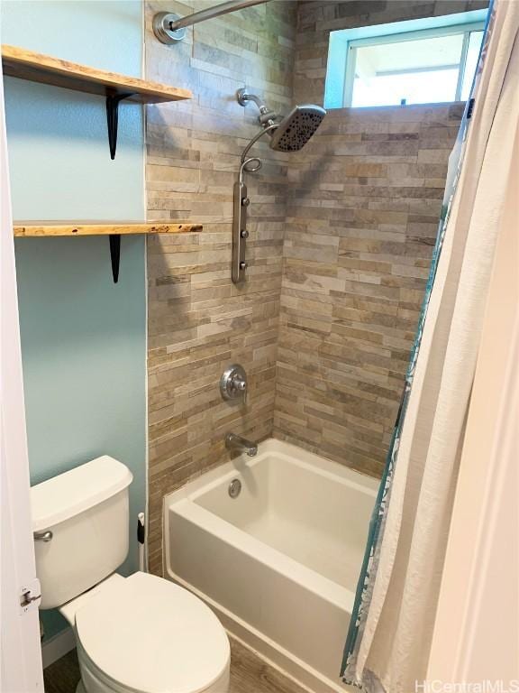 full bath with toilet and shower / tub combo with curtain