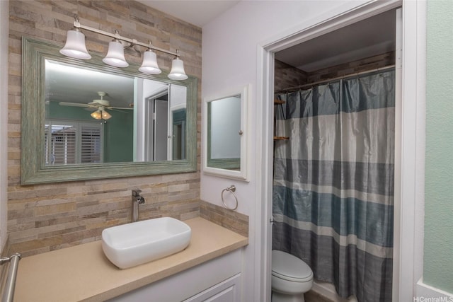 91-1016C Hoomaka St Unit 78, Ewa Beach, HI 96706 - bathroom featuring decorative backsplash, toilet, vanity, a ceiling fan, and a shower with shower curtain