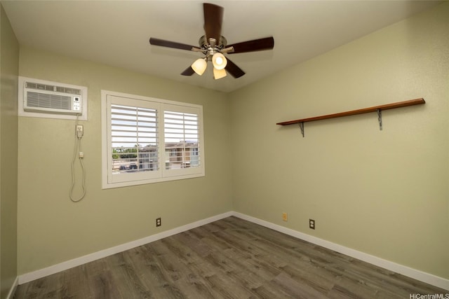 91-1016C Hoomaka St Unit 78, Ewa Beach, HI 96706 - empty room with a wall mounted air conditioner, dark wood-style floors, baseboards, and ceiling fan