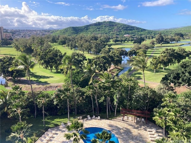 birds eye view of property featuring a mountain view