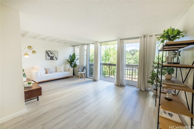 interior space featuring beam ceiling