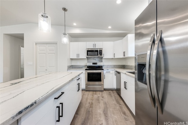 kitchen featuring white cabinetry, light wood-style flooring, recessed lighting, and appliances with stainless steel finishes