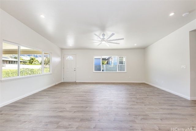 interior space with recessed lighting, baseboards, light wood-style floors, and ceiling fan