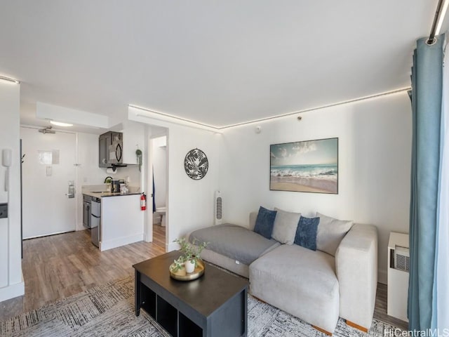 living room with light wood-style floors