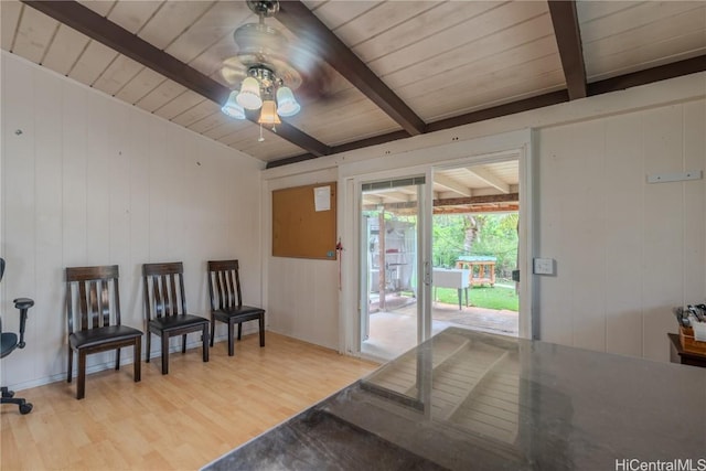 sitting room featuring wood ceiling, ceiling fan, beamed ceiling, and light wood-style flooring