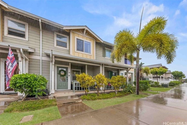 townhome / multi-family property featuring board and batten siding