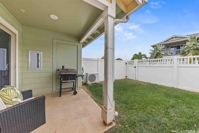 view of yard featuring ac unit, a fenced backyard, and a patio