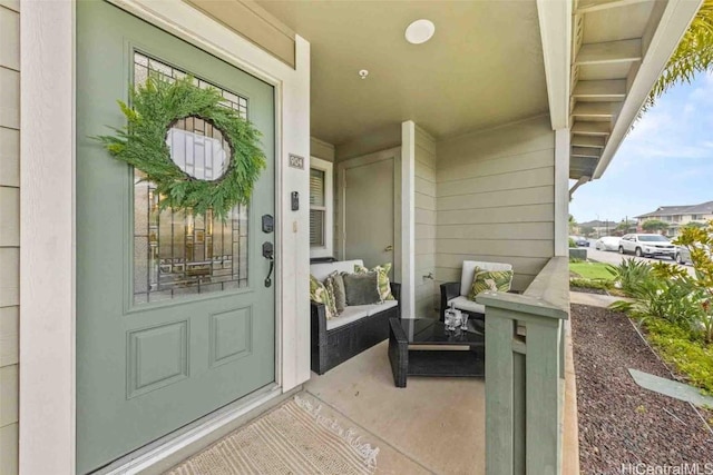 property entrance featuring a porch