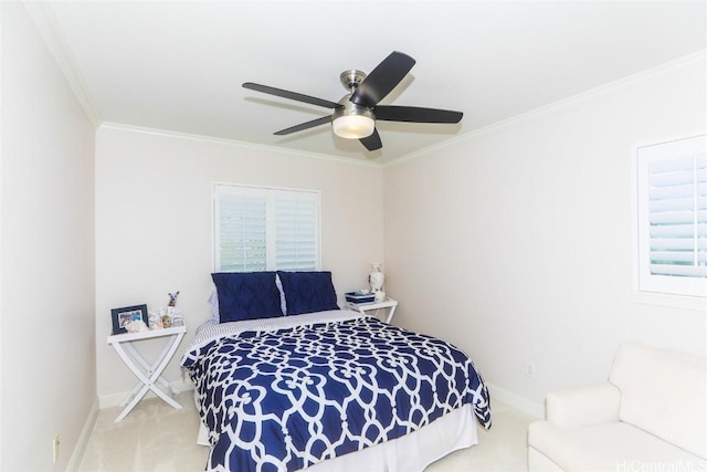 bedroom featuring ceiling fan, ornamental molding, carpet, and baseboards