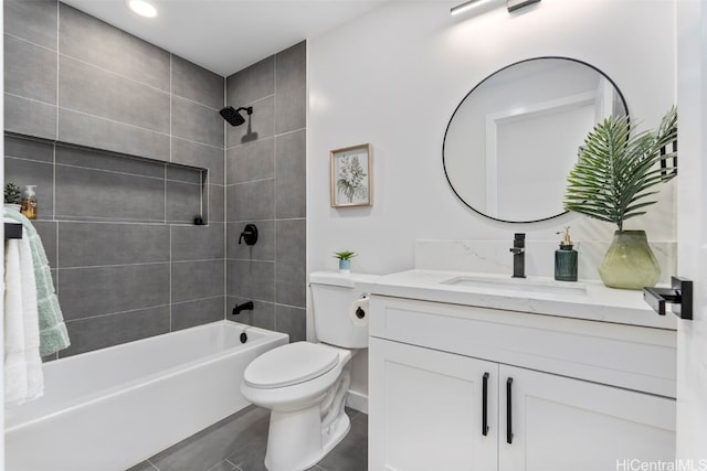 bathroom with toilet, tile patterned flooring, tub / shower combination, and vanity