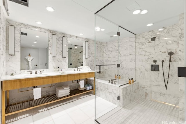 full bath featuring a marble finish shower, double vanity, recessed lighting, a sink, and a bath