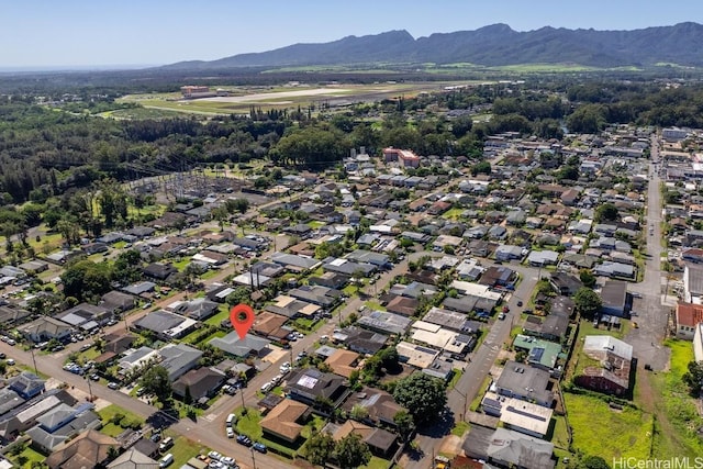 birds eye view of property with a residential view and a mountain view